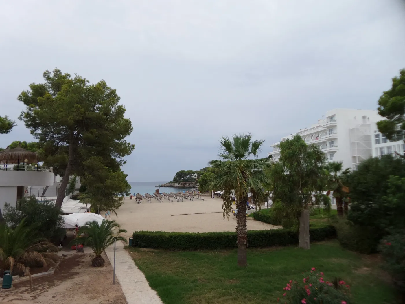 Calm shallow waters at Cala Gran, perfect for families with children