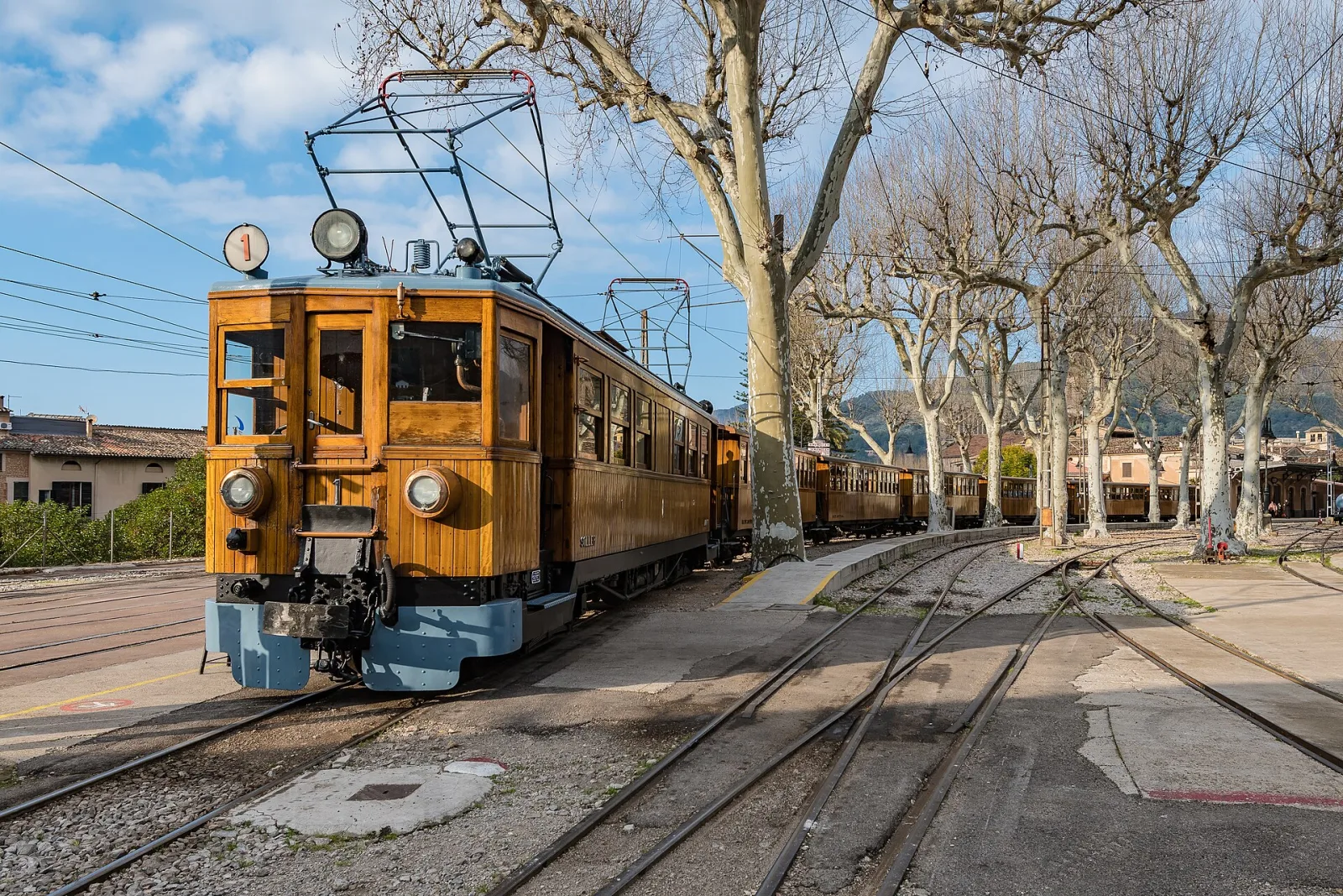 The vintage wooden Sóller train on the line through the Tramuntana mountains